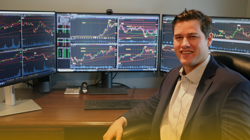 Meet Oliver Kell 1 Trading desk setup with multiple monitors showing charts